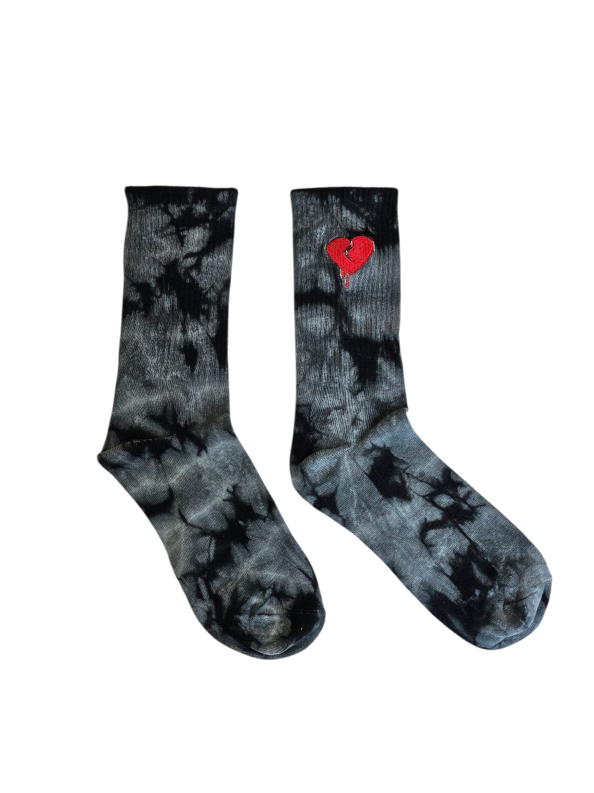 black tie-dye socks with a red heart design on a white background by latino streetwear brand Silva Espadas