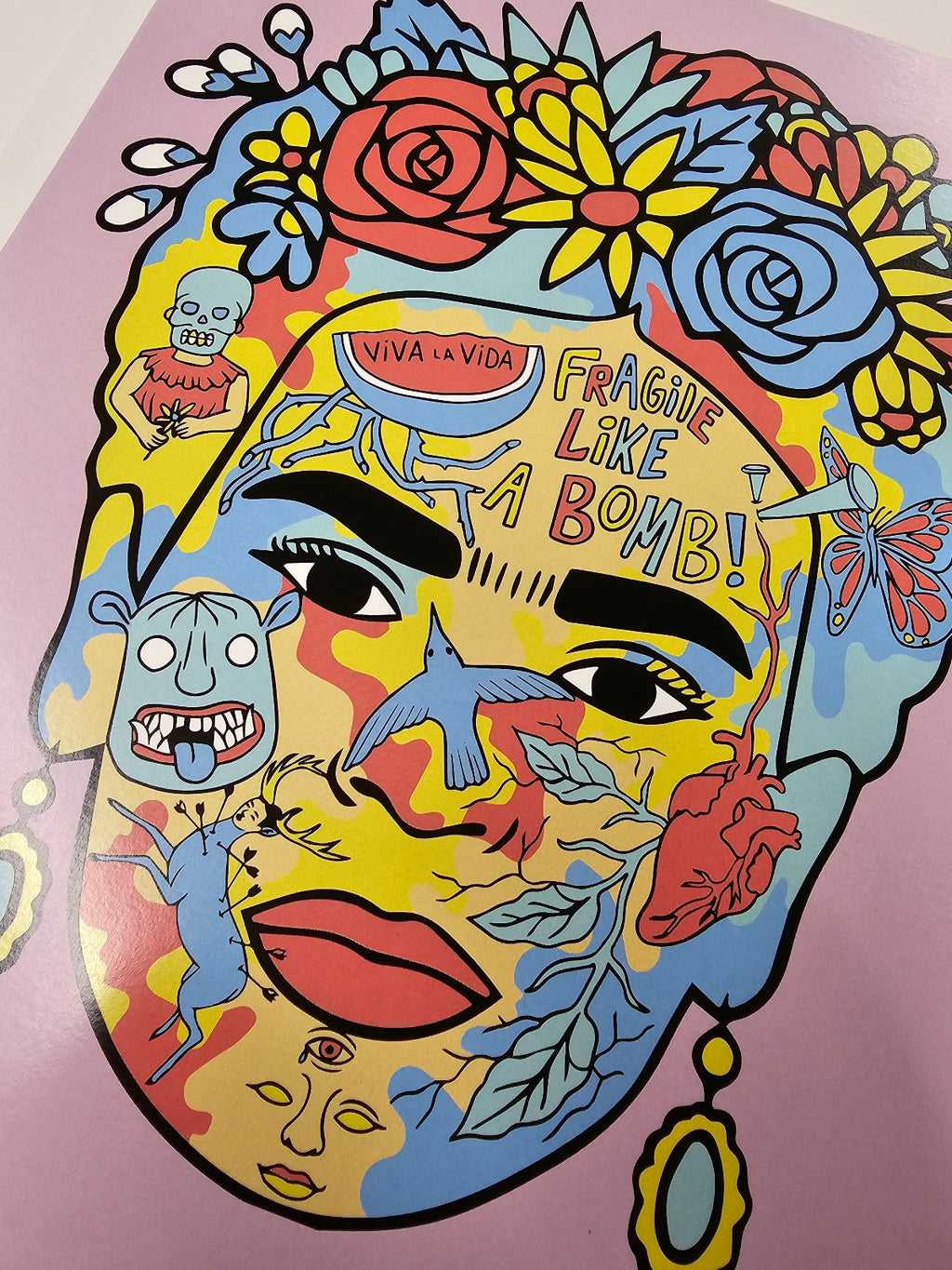 A Frida Khalo art print made up of some of her paintings 