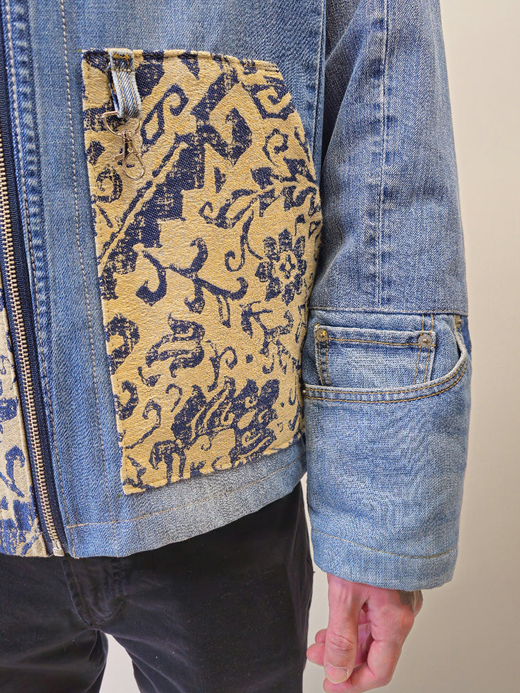 Detail view of a denim floral jacket