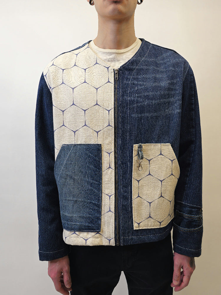 Person wearing a denim honeycomb jacket