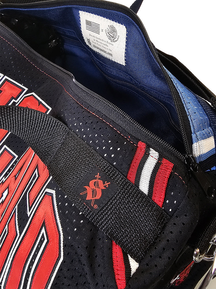 A handmade duffle bag of a Jordan Chicago Bulls and North Carolina jerseys