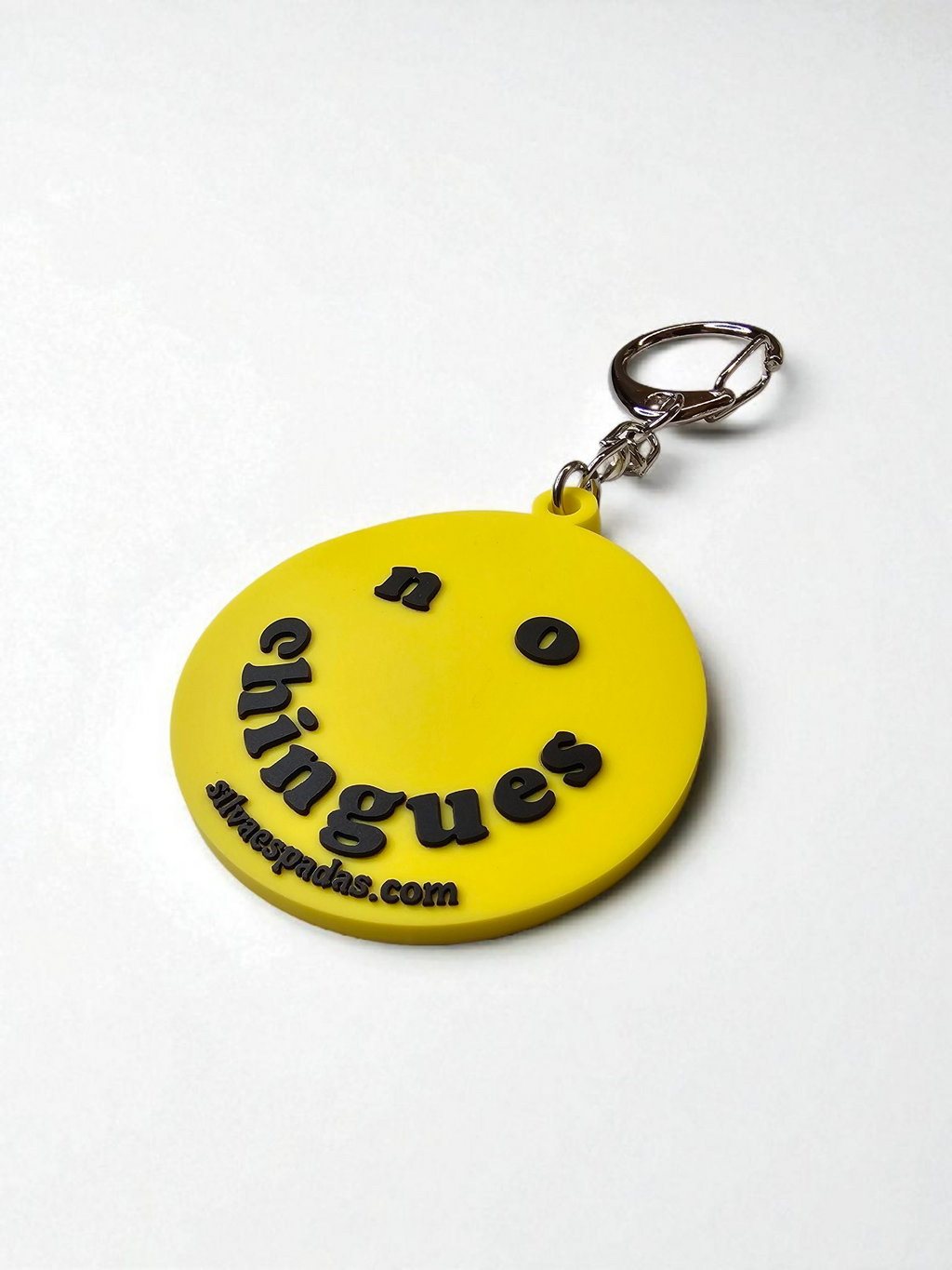 Yellow keychain with black text on a white background