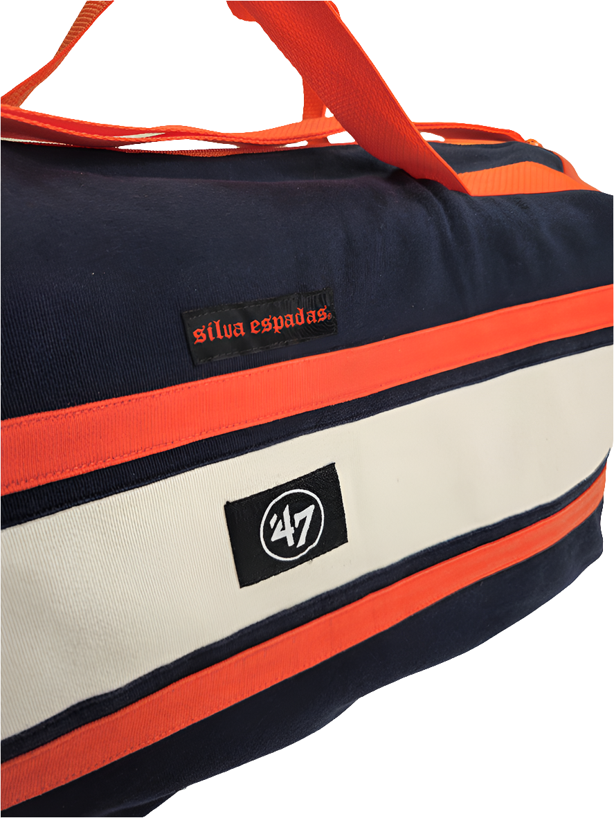 A navy and orange handmade duffle bag of Chicago Bears with orange straps and '47 brand branding
