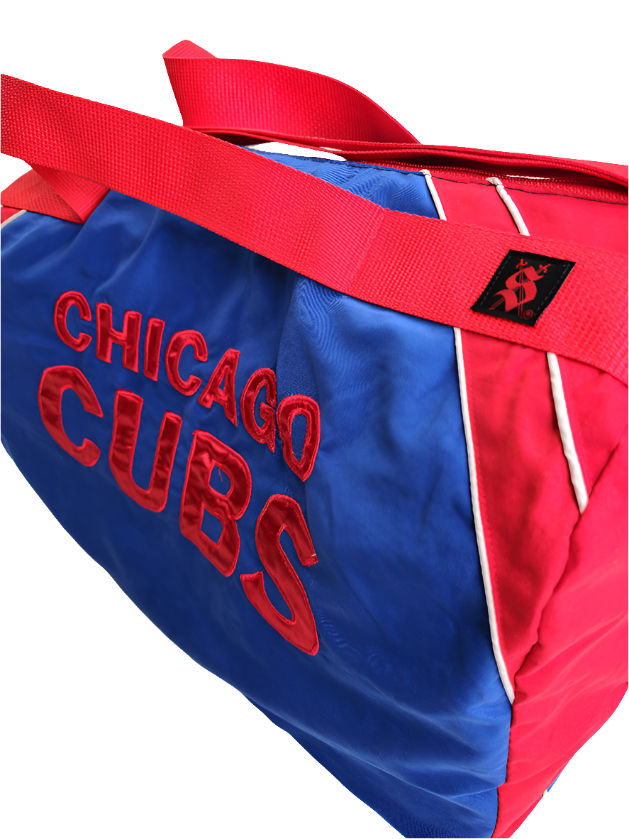 A custom handmade duffle bag made from a Chiago Cubs Genuine Merchendise jacket and heavy canvas, predominantly blue with red and white accents and the Cubs logo.