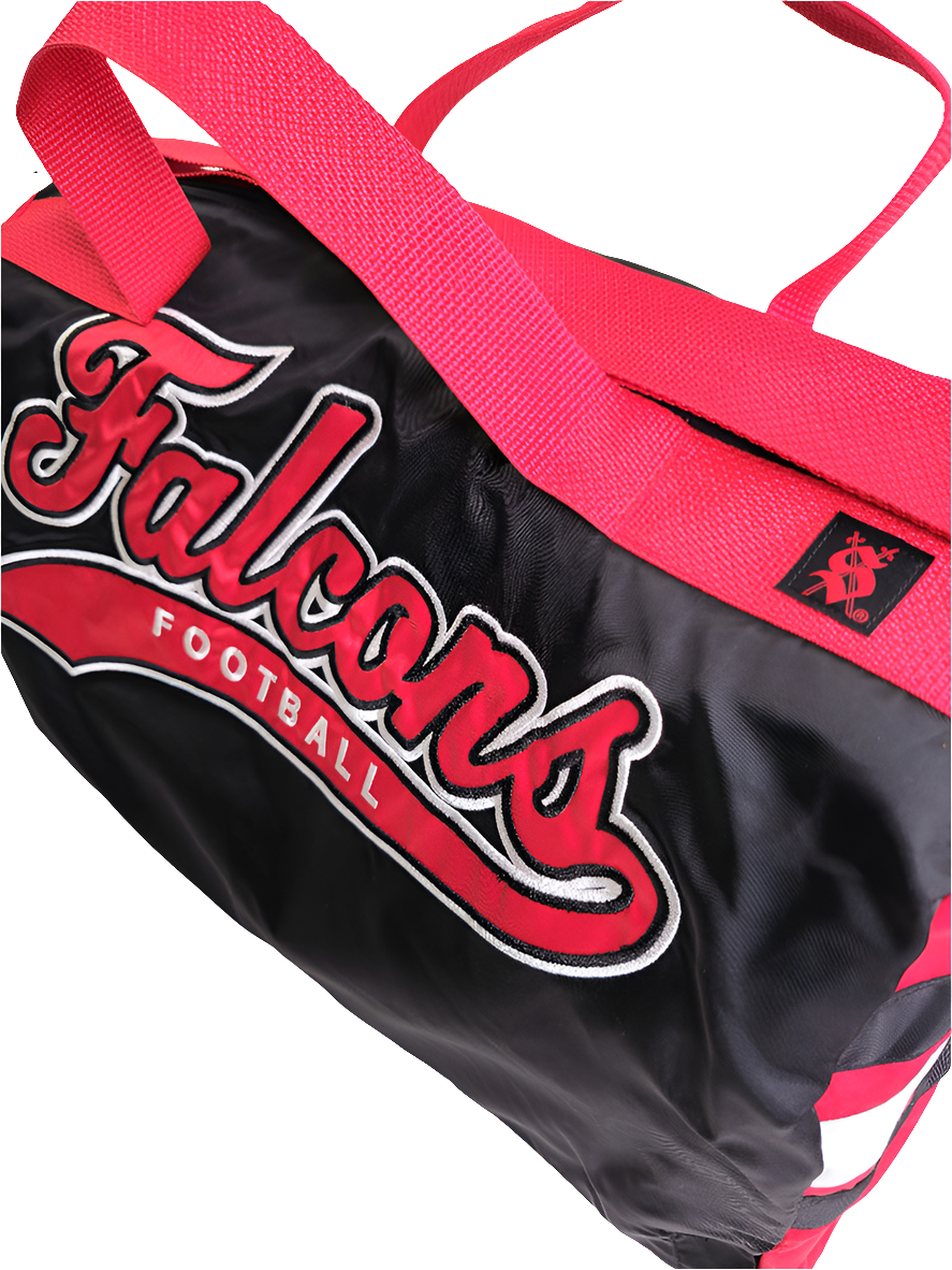 A custom handmade duffle bag made from a Atlanta Falcons jacket and heavy canvas, predominantly black with red accents and the Falcons logo.