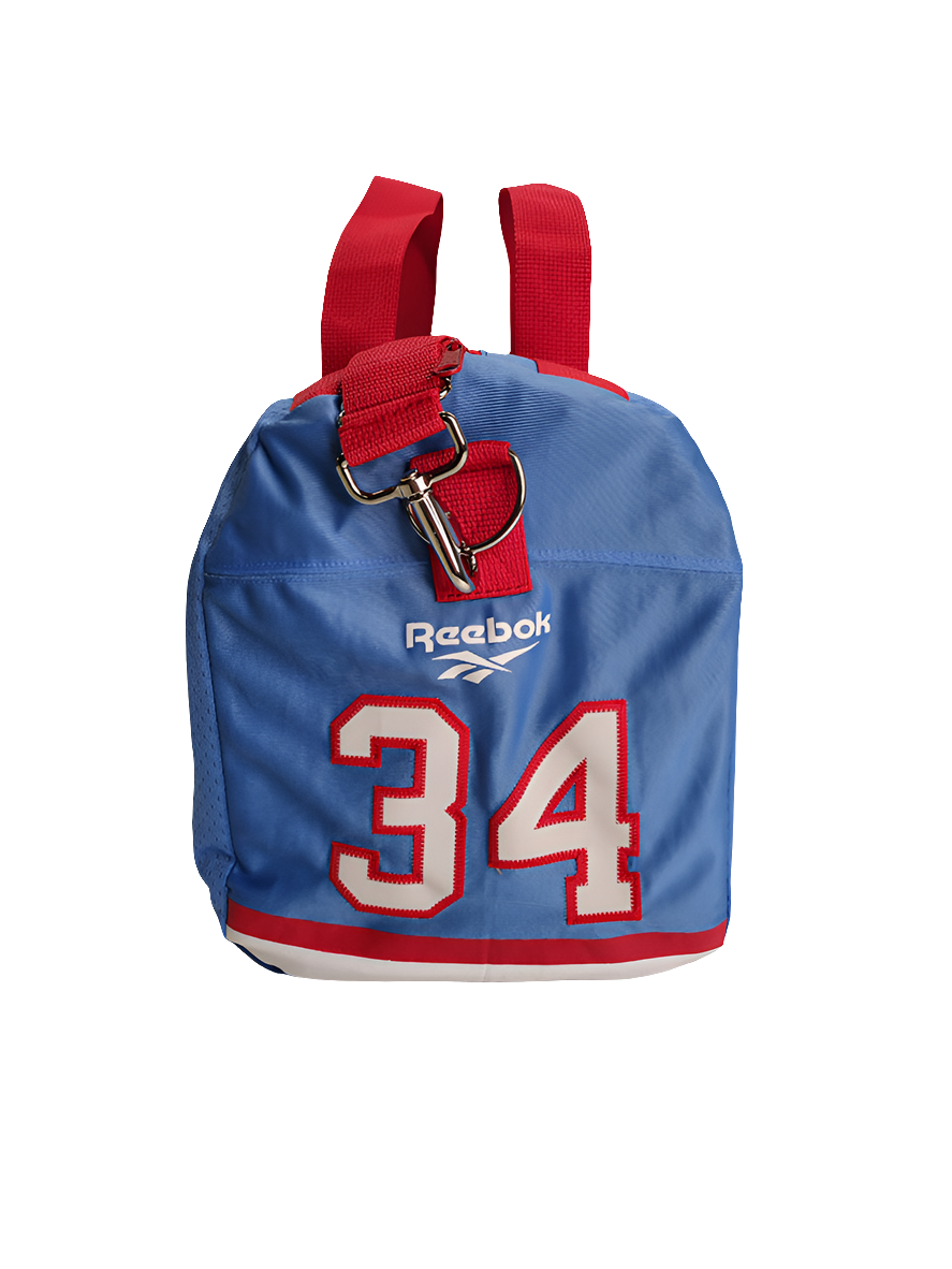 A custom handmade duffle bag made from a Houston Oilers Earl Campbell Reebok jersey in powder blue with red accents and the old school vintage Oilers logo