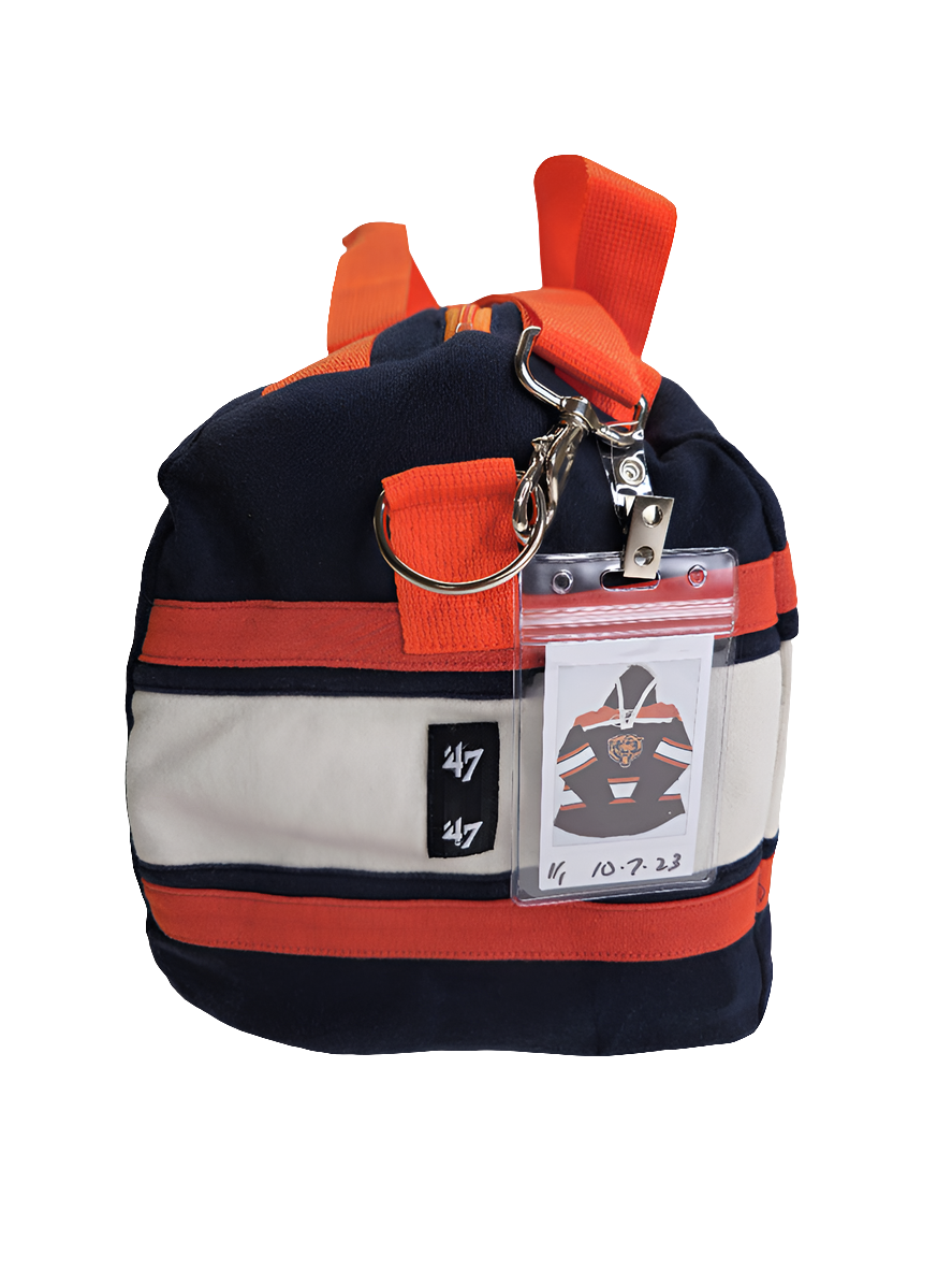 A navy and orange handmade duffle bag of Chicago Bears logo with orange straps and '47 brand