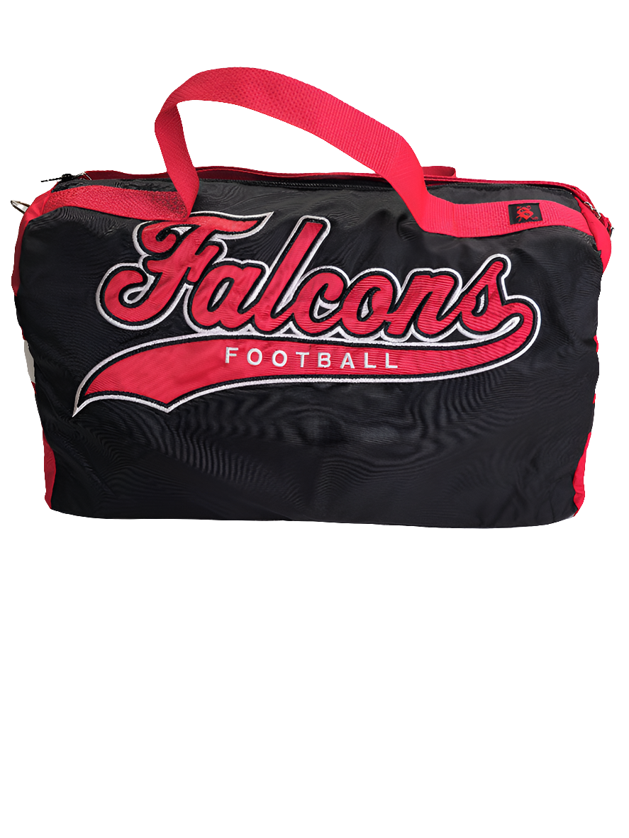 A custom handmade duffle bag made from a Atlanta Falcons jacket and heavy canvas, predominantly black with red accents and the Falcons logo.