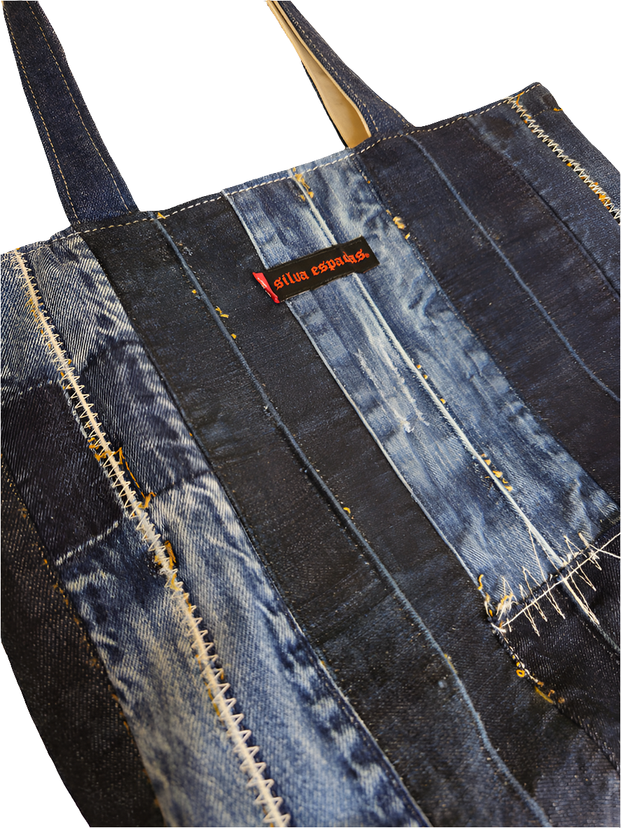 Detail view of a handmade denim distressed tote bag