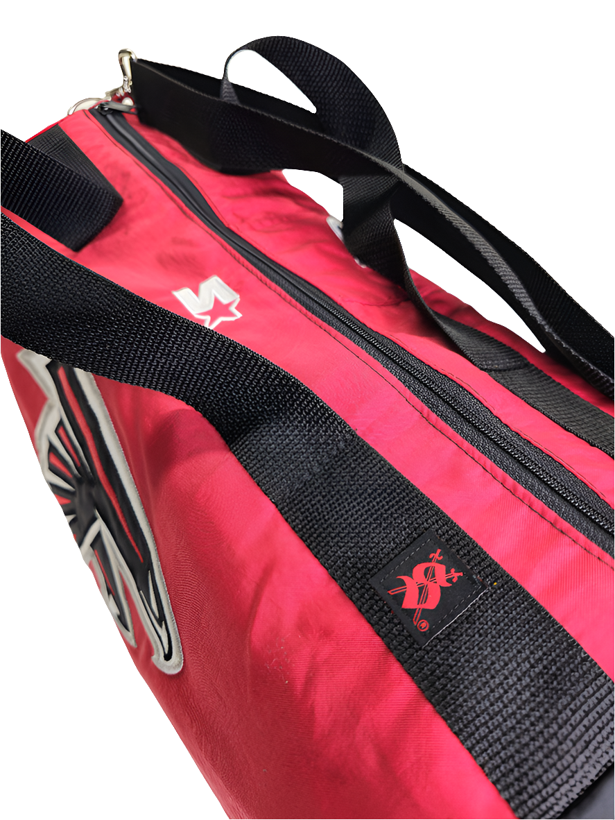 A red and black handmade duffle bag with the Atlanta Falcons logo and starter jacket hoodie design.