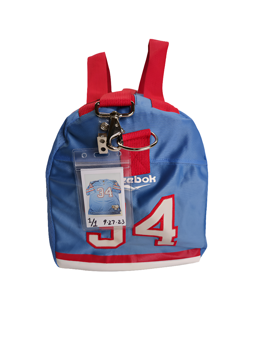 A custom handmade duffle bag made from a Houston Oilers Earl Campbell jersey in powder blue with red accents and the old school vintage Oilers logo