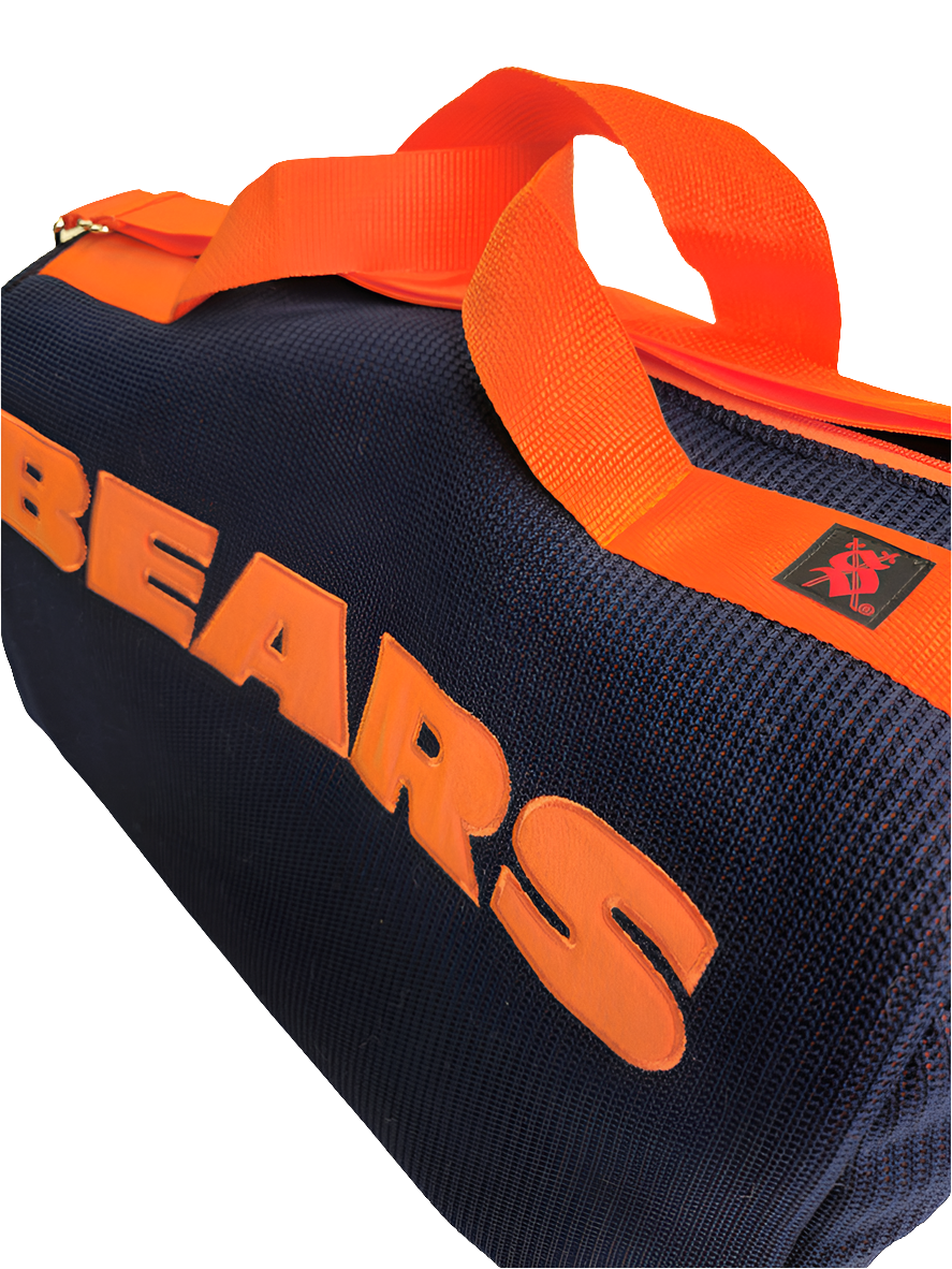 A navy blue handmade Chicago Bears duffle bag with the orange straps