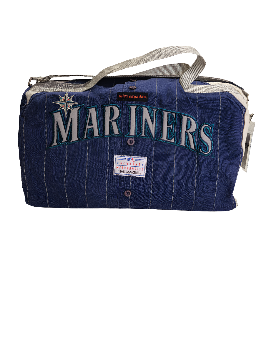 A blue handmade duffle bag with Seattle Mariners branding and the name 'Griffey' on the side, featuring a star design, a zipper closure, and an adjustable strap.
