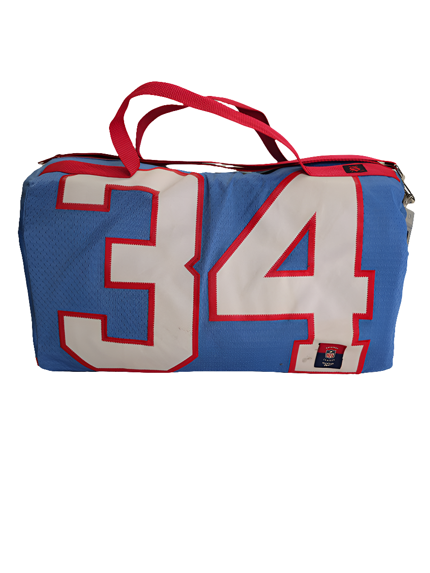 A custom handmade duffle bag made from a Houston Oilers Earl Campbell jersey in powder blue with red accents and the old school vintage Oilers logo