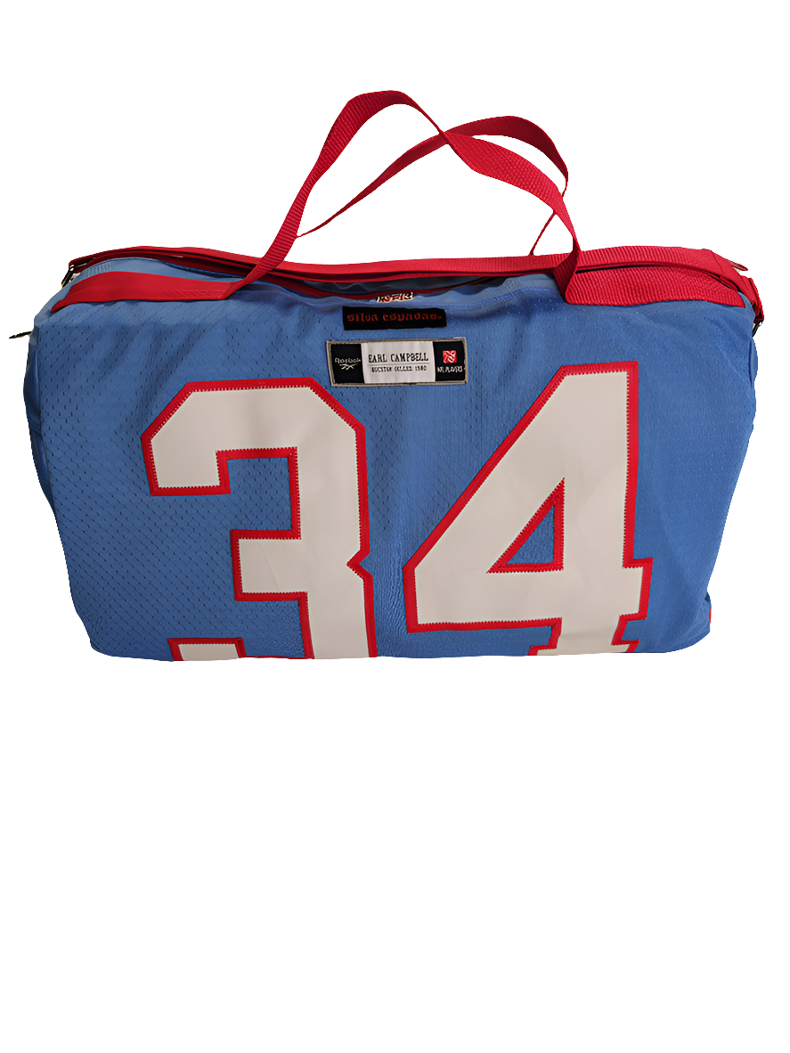 A custom handmade duffle bag made from a Houston Oilers Earl Campbell jersey in powder blue with red accents and the old school vintage Oilers logo