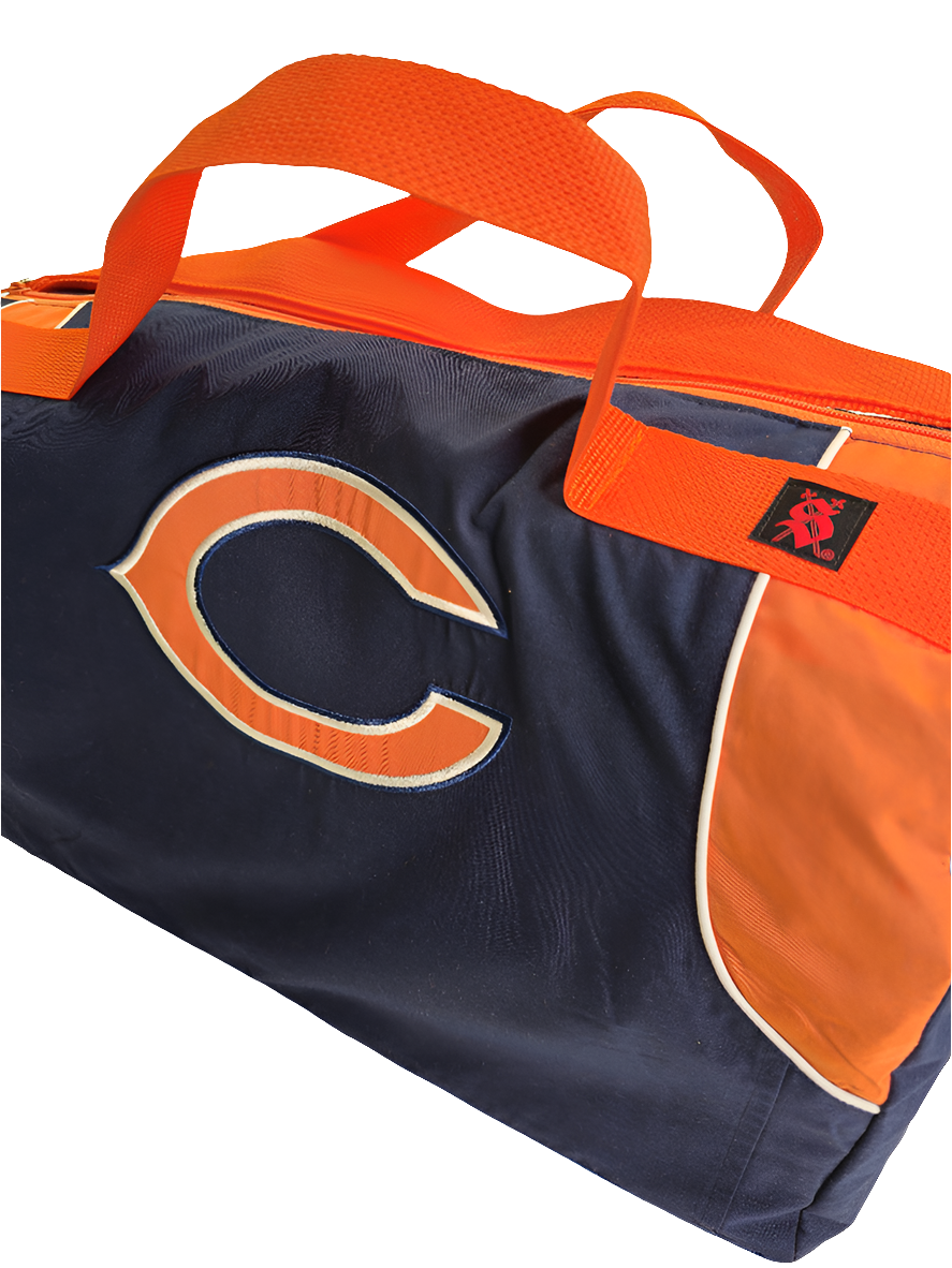 A custom handmade duffle bag made from a Chicago Bears jacket and heavy canvas, predominantly blue with orange accents and the Bears C logo.