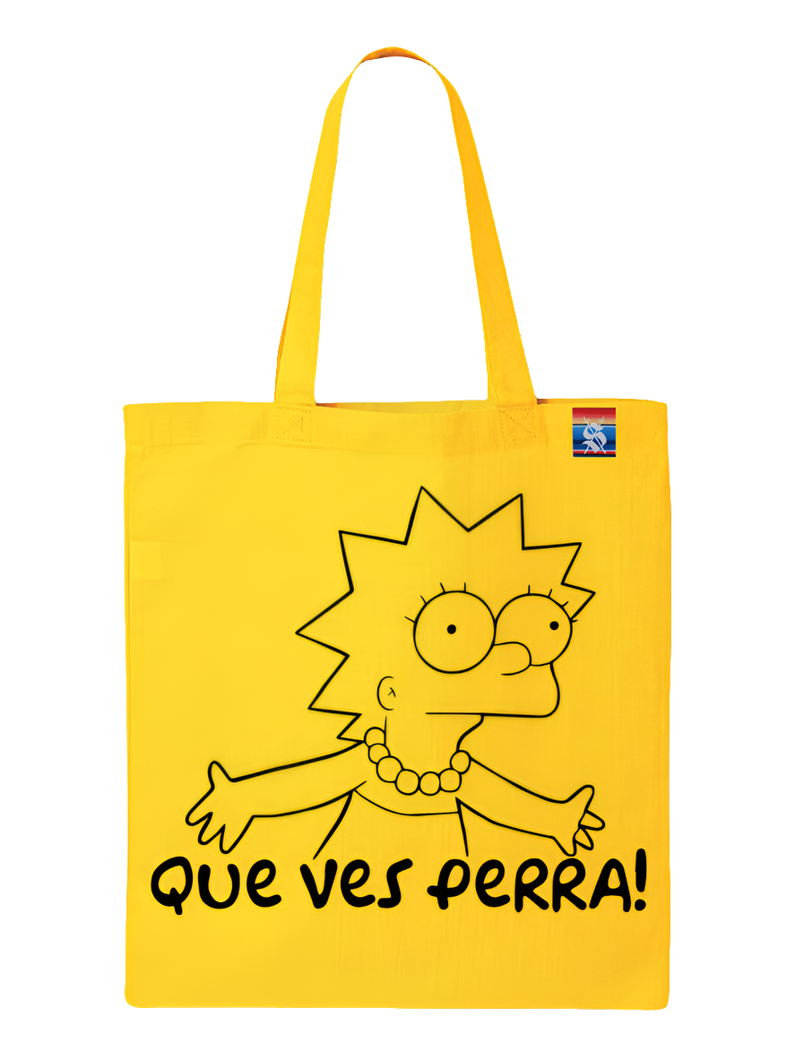 A yellow tote bag featuring a cartoon character and the text 'QUE VES PERRA!'