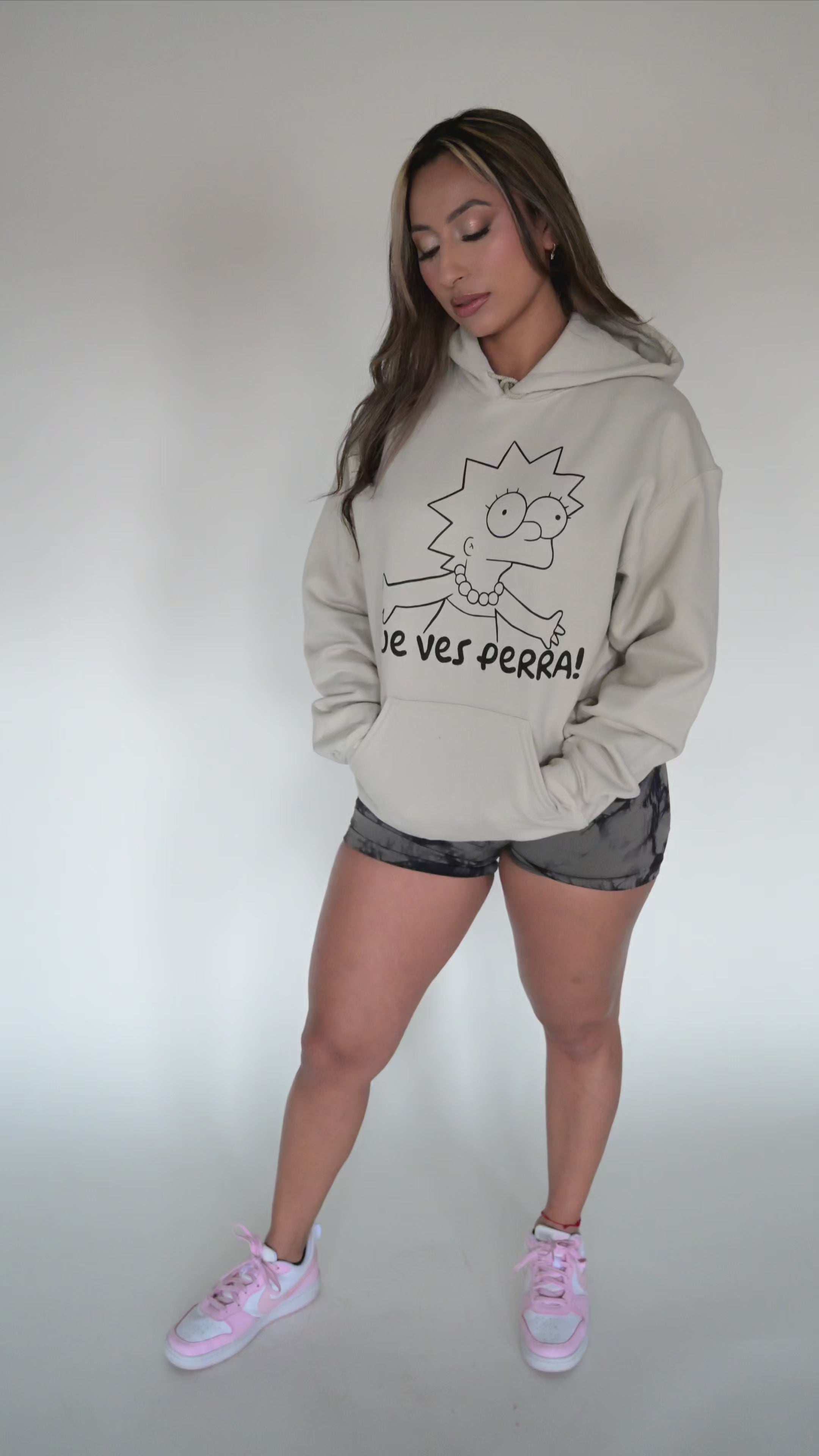 Model wearing Que Ves Perra Hoodie – unisex Mexican-inspired streetwear by Silva Espadas
