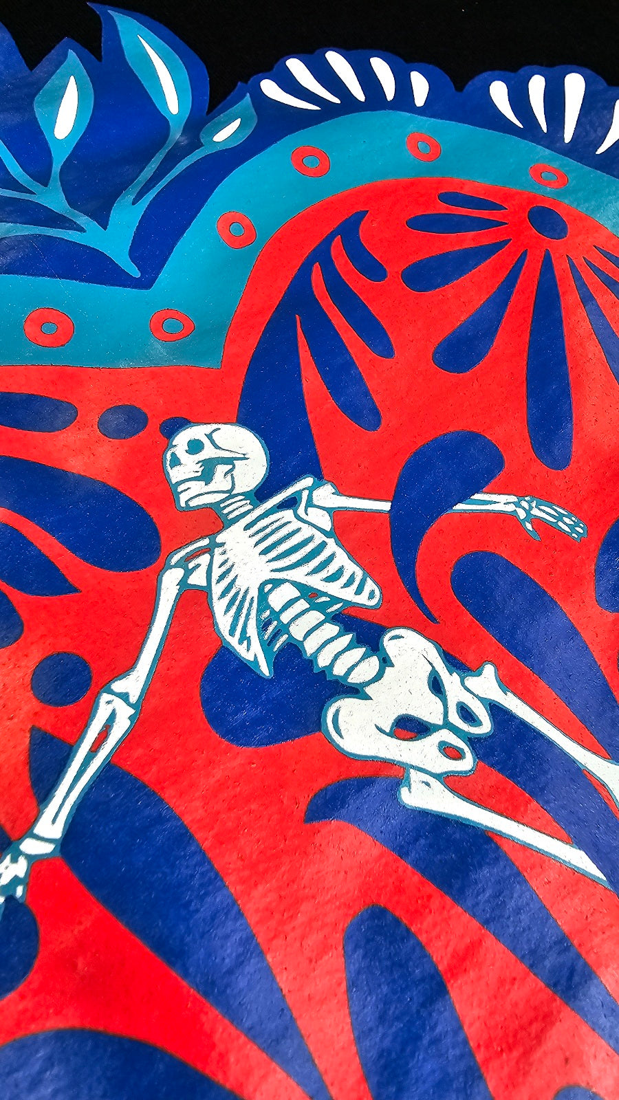 close up of a skeleton on a talavera heart design by Silva Espadas