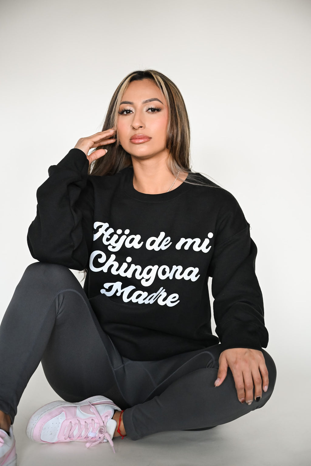 Model wearing Hija De Mi Chingona Madre Crewneck – unisex Mexican-inspired streetwear by Silva Espadas
