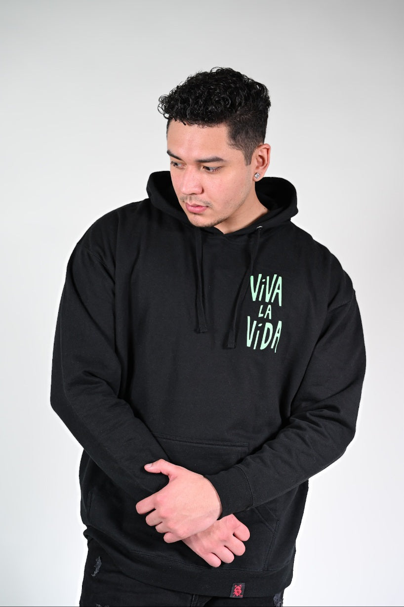 Silva Espadas Frida Hoodie styled in urban setting – Latino-owned fashion brand