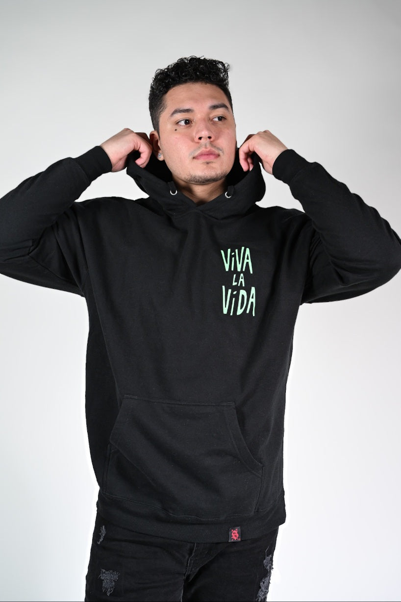 Silva Espadas Frida Hoodie styled in urban setting – Latino-owned fashion brand