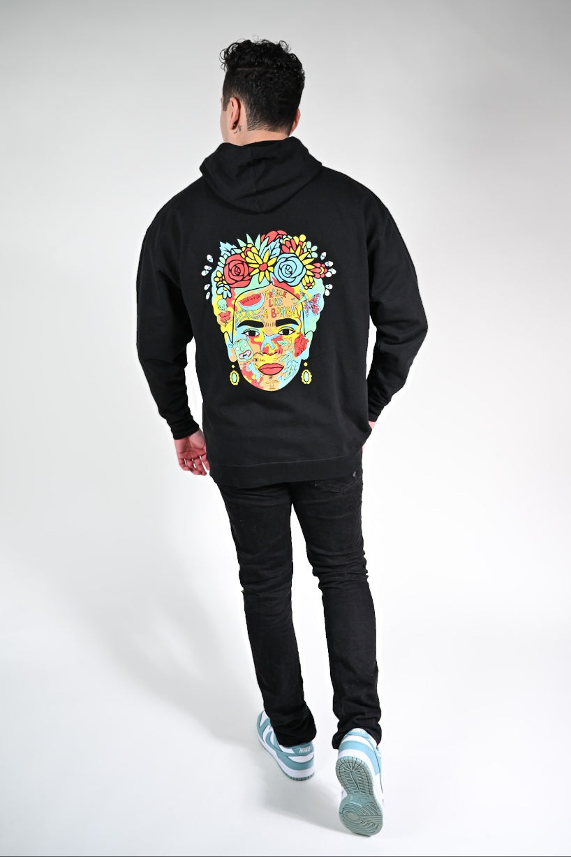 Model wearing Frida Hoodie – unisex Mexican-inspired streetwear by Silva Espadas