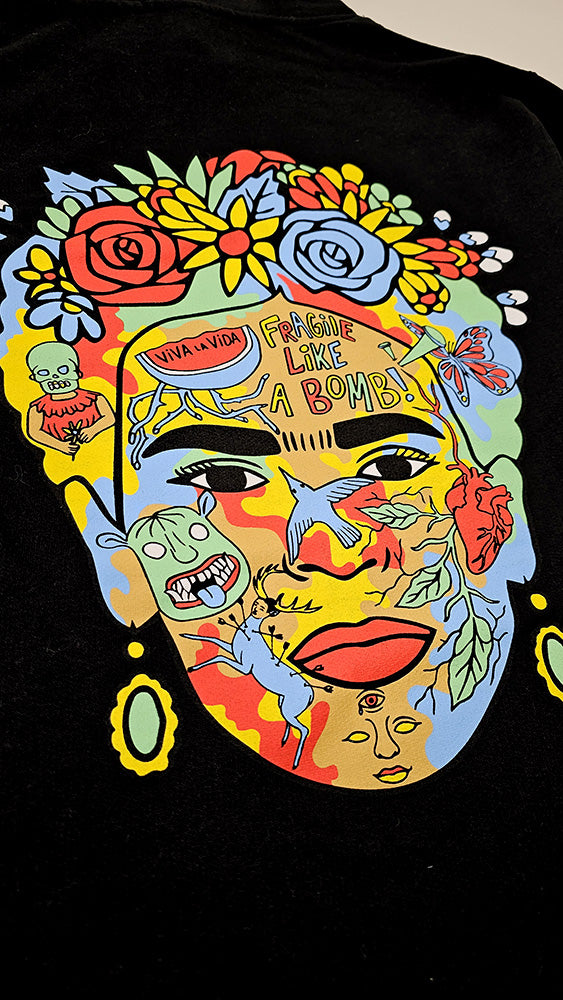 Frida Kahlo face collage made from her famous paintings on the back of Silva Espadas Frida Hoodie